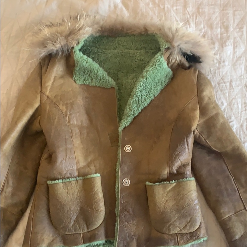 Leather shearling jacket with real fur collar